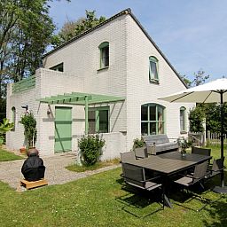 Ferienhaus F 789 in De Cocksdorp, Texel: charmante Unterkunft mit Sonnenterrasse und gruenem Garten, ideal fuer Entspannung auf den Watteninseln.
