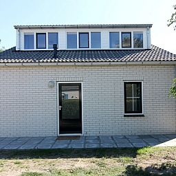 Vakantiehuis E 614 in De Cocksdorp, Texel: charmant vakantiehuis met moderne uitstraling, omringd door natuur op de Waddeneilanden.