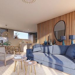 Stylishly furnished living room in the detached house in De Cocksdorp, Texel, with modern furniture and plenty of natural light.