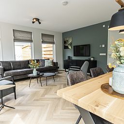 Stylish living room of Villa 39 in De Koog Texel with comfortable furniture.