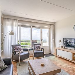 Gezellige zithoek in Appartement Juliana 146 Eiland en Zeezicht, De Koog, Texel met uitzicht op de Waddenzee.