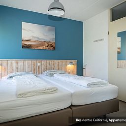 Volledig uitgeruste keuken in Type 3A vakantiehuis, De Koog, Texel met moderne apparatuur en strakke afwerking.