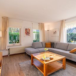 Cozy living room of Holiday home Honeysuckle 61 in De Koog, Texel, Wadden Islands.
