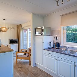 Gezellige woonkamer van De Veldleeuwerik vakantiehuis in De Koog, Texel, Waddeneilanden.