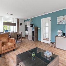 Open living space in Holiday home Honeysuckle 49, De Koog Texel, with stylish decor on the Wadden Islands.