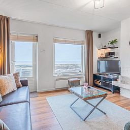 Stijlvolle woonkamer van Appartement Juliana 166 Zeezicht in De Koog, Texel met zeezicht.