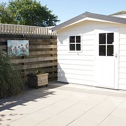 Bergschuur bij Chalet Bregkoog 138 'Sinne' in De Koog, Texel, ideaal voor opslag tijdens uw verblijf.