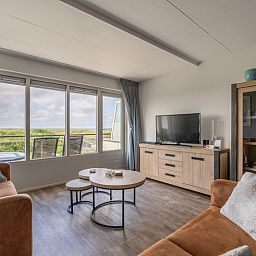 Gezellige zithoek in Appartement Juliana 096 Eiland en Zeezicht, De Koog, Texel met prachtig uitzicht.