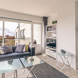 Cozy living room with views of Texel nature at Apartment Juliana 132 Eilandzicht in De Koog, Texel.