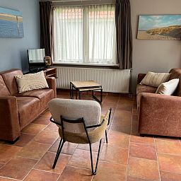 Gezellige woonkamer in Landgoed Springtij - Koetshuis 3, vakantiehuis in De Koog, Texel.
