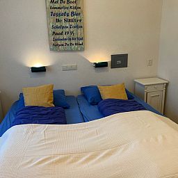Comfortabele slaapkamer in Landgoed Springtij - Koetshuis 3, gelegen in De Koog, Texel.