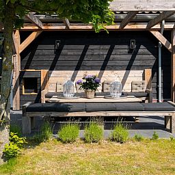 Residenz Rustiek in De Koog, Texel, Holzterrasse mit gemuetlichen Sitzgelegenheiten