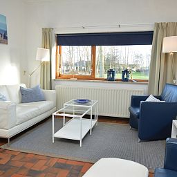 Gezellige zithoek in Orchismient 18 klein, vakantieverblijf op Texel.