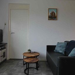 Gezellige woonkamer van NH198 vakantiehuis in Den Burg Texel.