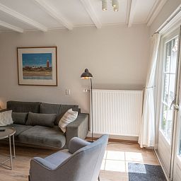 Gemuetliche Sitzecke im Ferienhaus Ants Nest Den Hoorn Texel mit Tageslicht