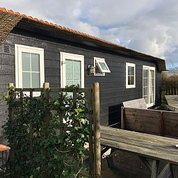 Vacation home at Holiday Park de Bremakker, Texel, with inviting outdoor space in De Dennen, ideal for an island stay.