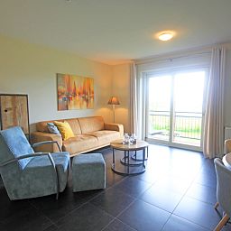 Helles Wohnzimmer mit Aussicht im Appartement Bos en Duin 42, De Dennen, Texel.