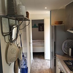 Cozy kitchen in Holiday Park de Bremakker, Chalet on Texel, with modern amenities in De Dennen, Wadden Islands.