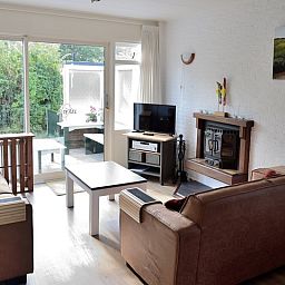 Gezellige woonkamer in Vakantiehuis de Parel 200, De Dennen Texel.