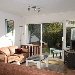 Comfortabele zithoek in Vakantiehuis de Parel 200, De Dennen Texel.