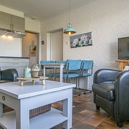 Moderne Kueche und gemuetliche Sitzecke im Ferienhaus Hans, Texel.