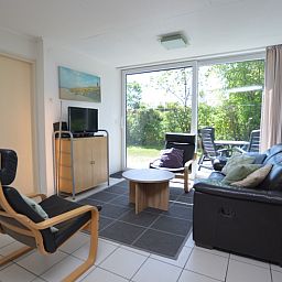 Komfortable Sitzecke im Ferienhaus de Parel 262, De Dennen, Texel. Geniessen Sie die Ruhe und Stille auf den Watteninseln.