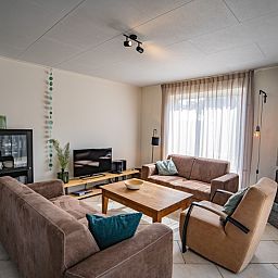 Comfortable sitting area in Holiday Home 't Hoogelandt 136A, De Dennen, Texel with lots of daylight.