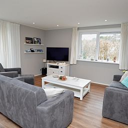 Gemuetliche Sitzecke im Holiday home de Parel 168, De Dennen, Texel, ideal zum Entspannen nach einem Tag auf den Watteninseln.