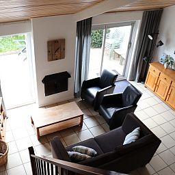 Cozy living room of Holiday home Gortersmient 290 in De Dennen, Texel.