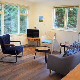 Helles Wohnzimmer im Ferienhaus Duinpieper, De Dennen, Texel mit moderner Einrichtung.