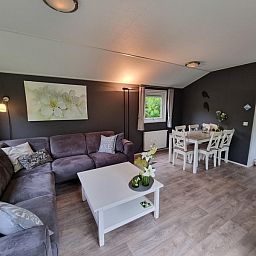 Comfortable sitting area in Vakantiepark de Bremakker vacation home in De Dennen Texel.