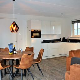 Stylish kitchen and dining area in vacation home Golden Raand, De Dennen, Texel.
