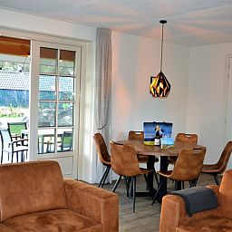 Dining room overlooking terrace in Golden Raand, De Dennen, Texel.