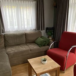 Gezellige zithoek in chalet De Clochard nr 37, Midsland Noord, Terschelling.