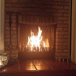 Cozy fireplace in Jans bungalow, Ballum, Ameland, for warm evenings on the Wadden Islands.