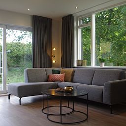 Cozy living room of Louwtjesduin Oost vacation home on Schiermonnikoog.