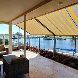 Marina near vacation home FR518 in Koudum, with boats and serene surroundings.