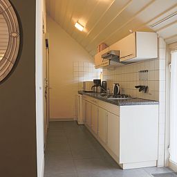 Modern kitchen in vacation home in Orvelte, Central Drenthe, equipped with all conveniences.