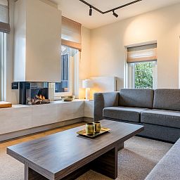 Stylish sitting area in Hof van Saksen, 12-bed Luxury Culinary Farmhouse in Nooitgedacht, Central Drenthe.