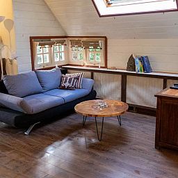 Gemuetliches Mansardenzimmer im Ferienhaus DG1404 in Norg, Nord-Drenthe mit drei Betten.
