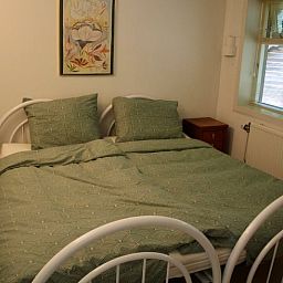 Gemuetliches Schlafzimmer im Ferienhaus in Norg, Nord-Drenthe, mit bequemem Bett und erholsamer Einrichtung.