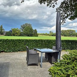 Geniessen Sie die ruhige Umgebung auf der Terrasse des Ferienhauses in Dalerveen, das im schoenen Sued-Ost-Drenthe liegt.