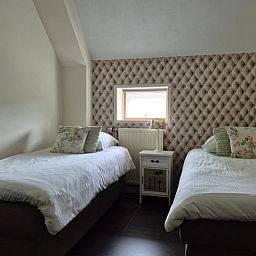 Gemuetliches Schlafzimmer im Ferienhaus in Dalerveen, Suedost-Drenthe, mit bequemen Betten und gemuetlicher Einrichtung fuer einen entspannten Aufenthalt.