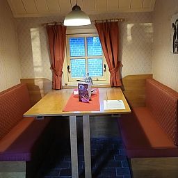 Cozy dining area in Holiday home in Stieltjeskanaal, Southeast Drenthe. Enjoy a cozy indoor space in this charming vacation home.