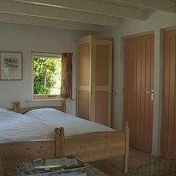 Schlafzimmer in Cottage in Zuidwolde, Ferienhaus mit Holzmoebeln, Suedwest-Drenthe, Drenthe.