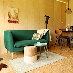 Cozy living room in Holiday Home in Vledder, Southwest Drenthe, with modern furnishings.