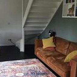 Stijlvolle woonkamer van Vakantiehuis in Wapse, Zuidwest Drenthe, met comfortabele zitruimte.