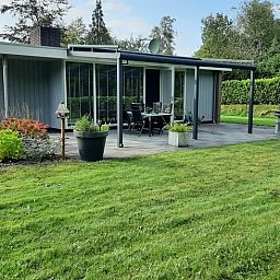 Cozy sitting area in Holiday Home in Wittelte, perfect for a relaxing stay in Drenthe.