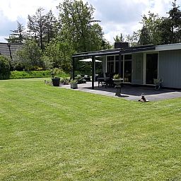 Veranda of Holiday Home in Wittelte, Southwest Drenthe, with beautiful views of the garden.
