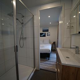 Modern bathroom and bedroom in detached house in Biddinghuizen, vacation home in Eastern Flevoland, Flevoland.